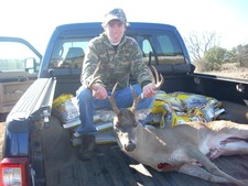 Cody takes a nice first buck with his bow.